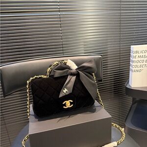 Chanel Black Quilted Crossbody with Gold Accents